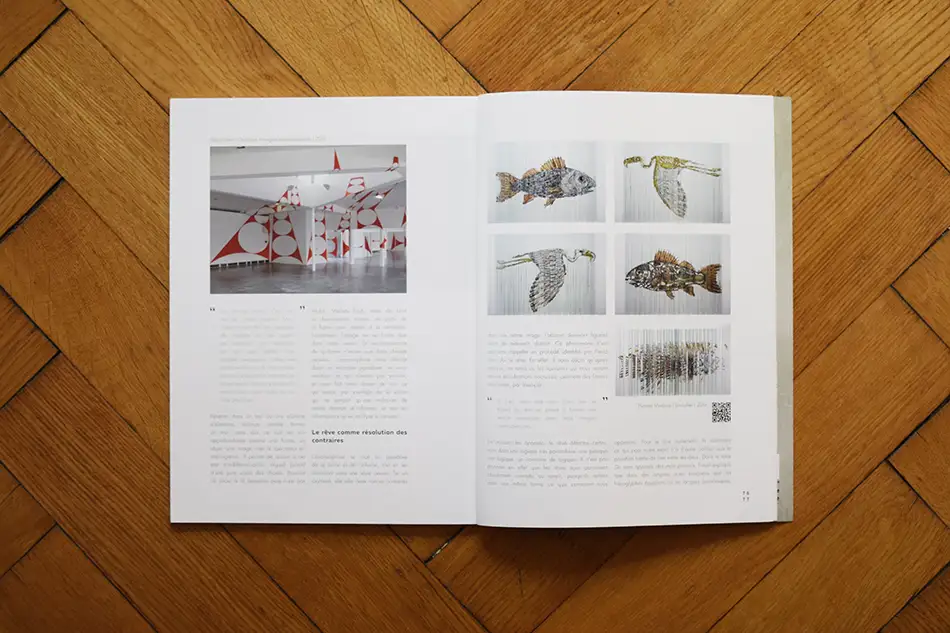 Publication of glass cube with four anamorphic paintings