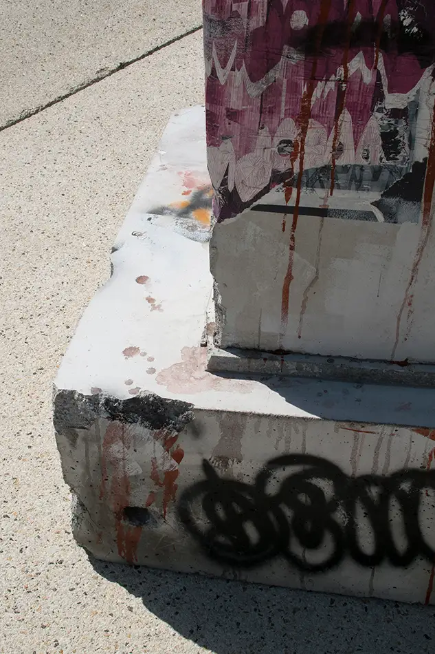 detail of dilapidated concrete lectern as art in public space