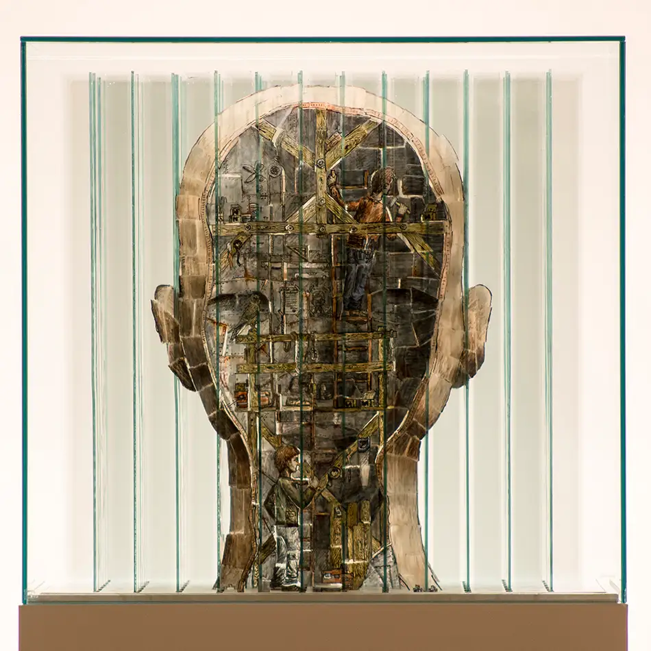 Anamorphic artwork - glass cube with four different images composed of image fragments - backside of a stage