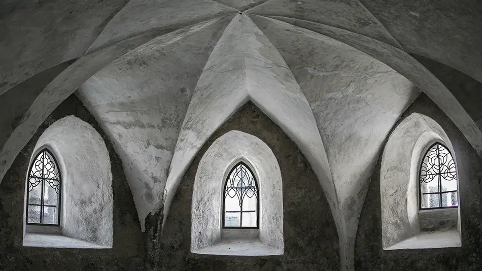 Stained glass windows in the gothic crypt of Liebfrauenkirche in Kitzbühel