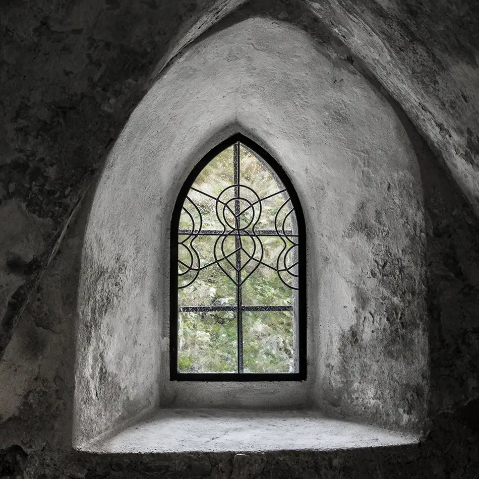 lead-light window in the gothic crypt of Liebfrauenkirche in Kitzbühel