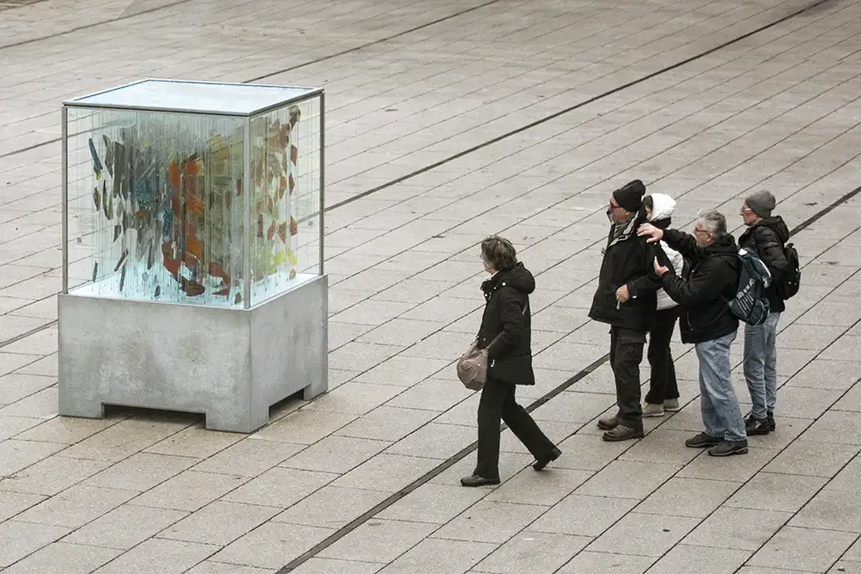 Human Animal Binary - anamorphic stained glass ecological art installation - spectators in public space - Landestheater Innsbruck