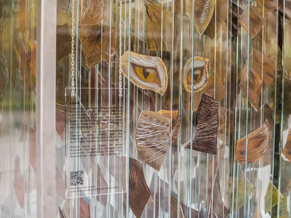 Human Animal Binary - anamorphic stained glass ecological art installation - close up lynx