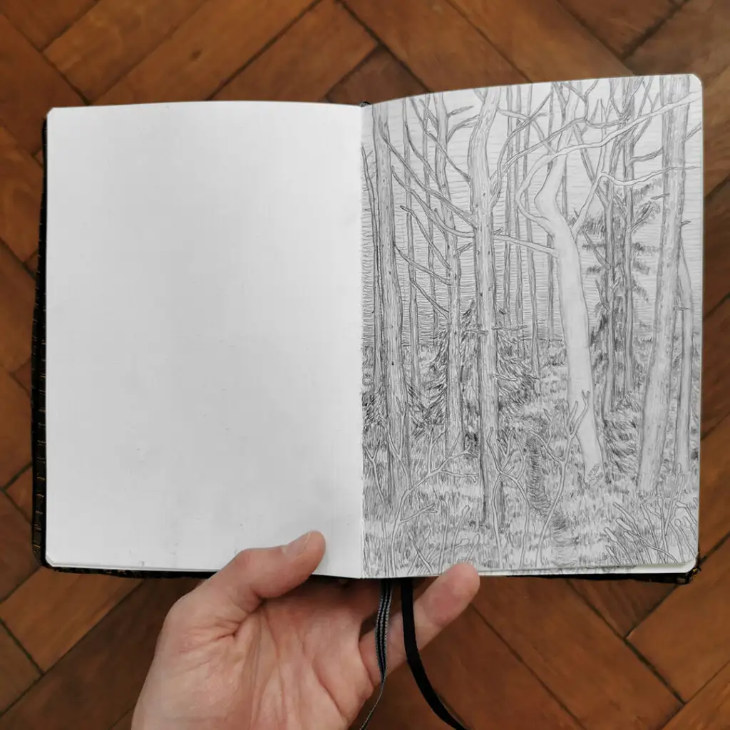 Polytrauma - Serie von Bleistiftzeichnungen in Skizzenbuch - Wald in Hochzirl mit Skizzenbuch in Hand